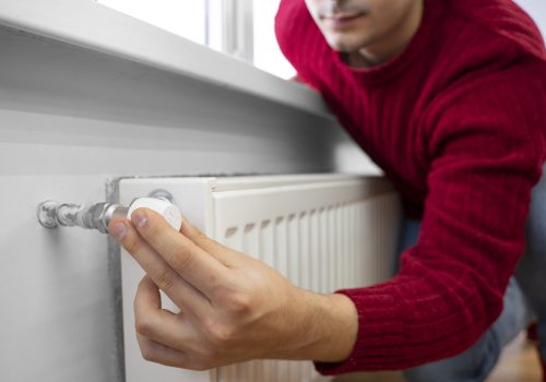 close-up-man-using-rotary-switch